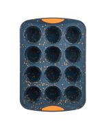 image shows Trudeau 12-Count Muffin Pan | Pumpkin Confetti against a blank, white background