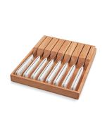 WÜSTHOF Gourmet White 9-Piece Steak Knife Set against a white background in a wooden knife box. the image is shot angled, slightly from above.
