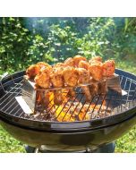 A grill featuring chicken legs being grilled, highlighting a savory outdoor cooking moment.