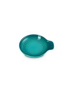 image shows Le Creuset Stoneware Signature Round Spoon Rest, 6 in. - Blue Riviera against a blank, white background