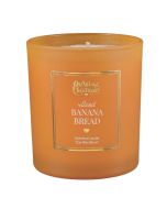image shows Old World Christmas Candle | Iced Banana Bread Candle  against a blank, white background