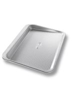 image shows USA Pan Small Cookie Sheet Pan against a blank, white background