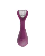 here we a ginger peeler/slicer/grater laying flat on a white background 