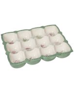 image shows Danica Heirloom Camellia Egg Holder | Sage against a blank, white background  