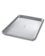 image shows USA Pan Extra Large Cookie Sheet Pan against a blank, white background