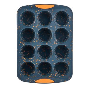 image shows Trudeau 12-Count Muffin Pan | Pumpkin Confetti against a blank, white background
