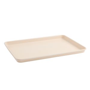 image shows Trudeau Resistall 10" x 15" Baking Sheet | Beige against a blank, white background