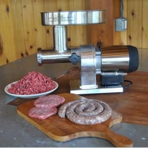 https://cdn.everythingkitchens.com/media/catalog/product/cache/165d8dfbc515ae349633b49ac444a724/0/9/09-0801-w_weston_butcher_series_commercial_grade_8_electric_meat_grinder_-_0.5_hp_lifestyle.jpg