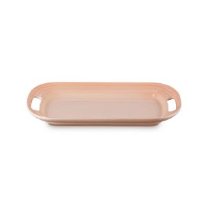 image shows Le Creuset Serving Platter | Peche against a blank, white background