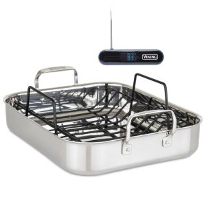 Viking 3-Ply Roasting Pan With Rack and Thermometer Set Against a Plain White Background