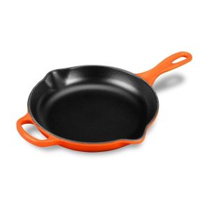  image shows Le Creuset 9" Signature Enameled Cast Iron Skillet | Flame against a blank, white background