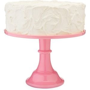 True Cakewalk Pink Melamine Cake Stand with a frosted cake on top