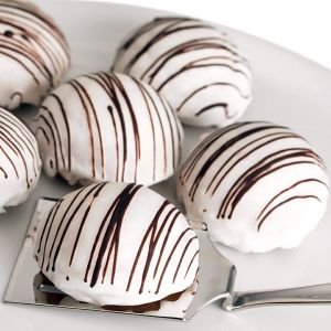 Beautiful white semifreddo with chocolate stripes made with the Silikomart Semisfera 1" Diameter Baking Mold