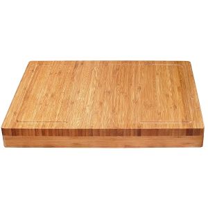 image shows Lipper International Bamboo Over-the-Counter-Edge Cutting Board against a blank, white background