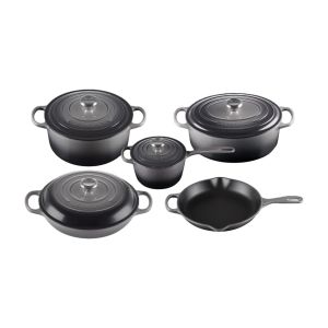 image shows Le Creuset 9 Piece Signature Set, Oyster (5.5 qt, Sig. RDO, 6.75 qt. S ig. ODO, 3.5 qt. S against a blank, white background