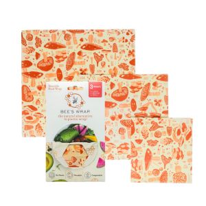 Three distinct paper bags featuring unique designs, showcasing various colors and patterns.