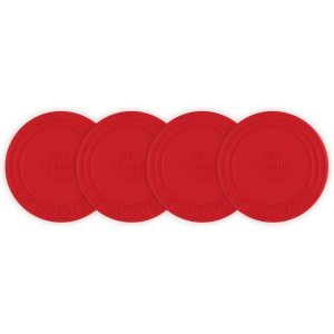 image shows Le Creuset Silicone Coasters (Set of 4) | Cerise against a blank, white background