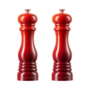 image shows Le Creuset Salt And Pepper Mill Set | Cerise against a blank, white background