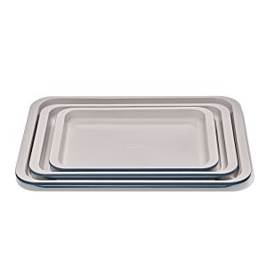 image shows OXO Good Grips Non-Stick Pro Ceramic Coated Metal Bakeware 3-Piece Sheet Pan Set | Storm Blue against a blank, white background