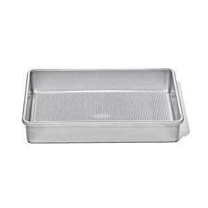 image shows OXO Good Grip Non-Stick Pro 9" x 13" Cake Pan | Clear Coated against a blank, white background