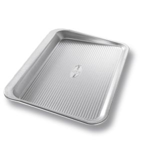 image shows USA Pan Small Cookie Sheet Pan against a blank, white background