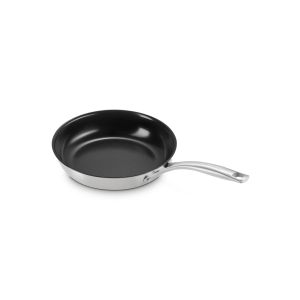 Shallow Round Fry Pan against a blank white background with the handle angled towards the camera