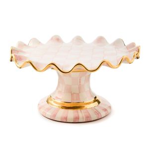  image shows MacKenzie-Childs Rosy Check Ceramic Fluted Cake Stand against a blank, white background
