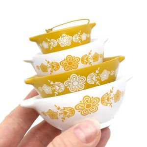 image shows Twinkl Toast Pyrex-Inspired Miniature Cinderella Bowl Stack Ornament | Butterfly Gold against a blank, white background