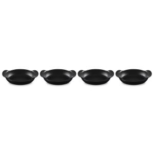 Le Creuset Gourmand Collection 0.75 Qt. Mini Oval Baker | Set of 4 against a white background shot slightly from above