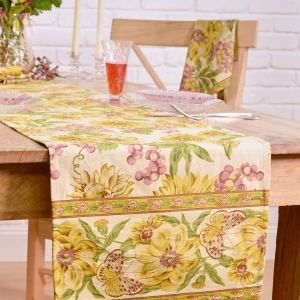 April Cornell 13" x 72" Primavera Table Runner | Natural overhanging on a tabletop