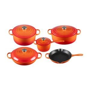 image shows Le Creuset 9 Piece Signature Set, Flame (5.5 qt, Sig. RDO, 6.75 qt. Sig. ODO, 3.5 qt. S against a blank, white background