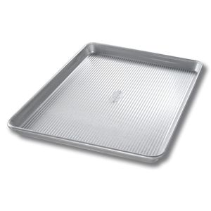 image shows USA Pan Extra Large Cookie Sheet Pan against a blank, white background