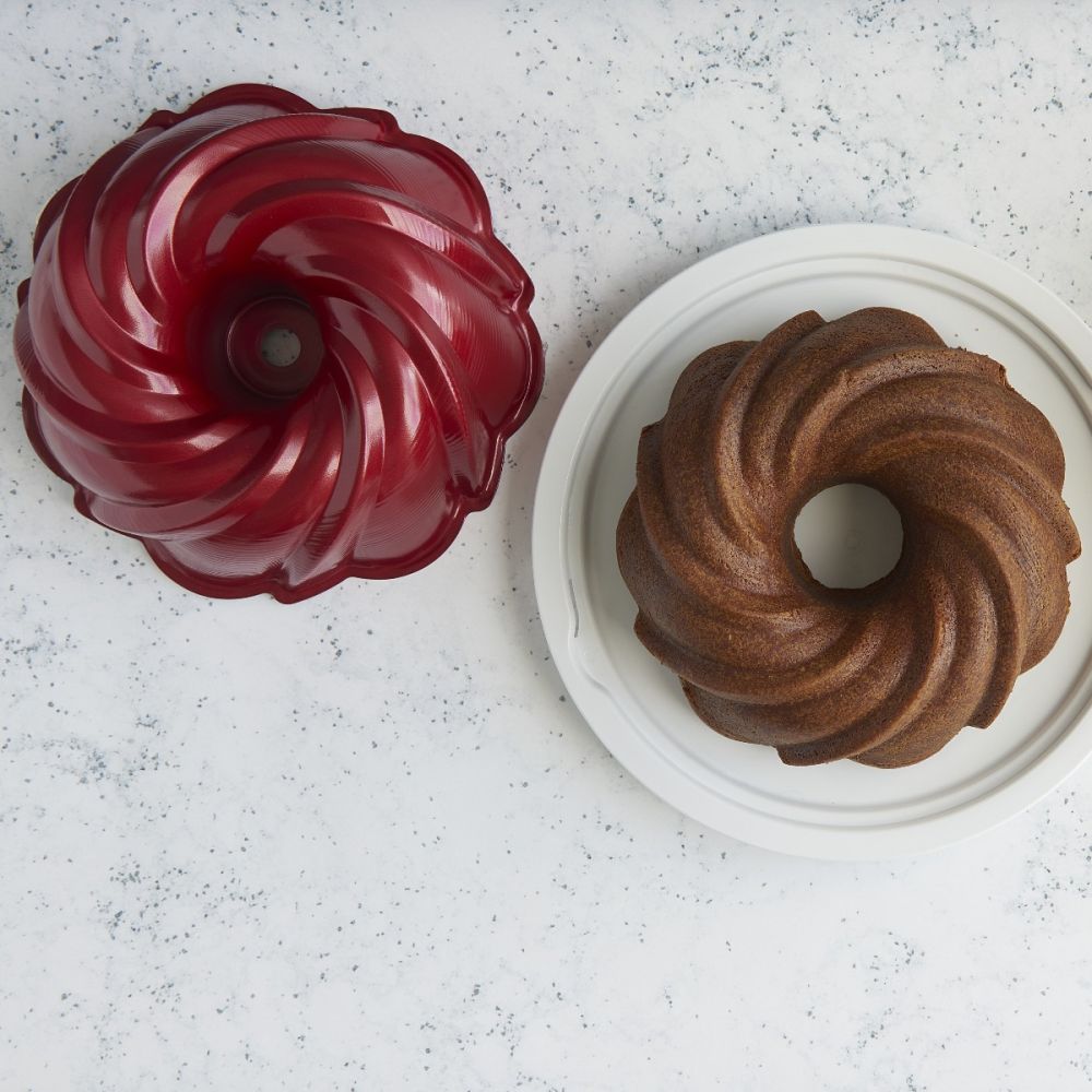 Holiday Formed 11-Cup Swirl Bundt Pan (Red) | Nordic Ware