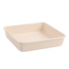 image shows Trudeau Resistall 9.45" x 9.45" Square Pan | Beige  against a blank, white background Image