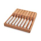 W&Uuml;STHOF Gourmet White 9-Piece Steak Knife Set against a white background in a wooden knife box. the image is shot angled, slightly from above. Image