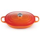 Le Creuset Signature 3.75 Qt. Oval Casserole against a white background shot from the side slightly above Image