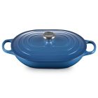 Le Creuset Signature 3.75 Qt. Oval Casserole against a white background shot from the side slightly above Image