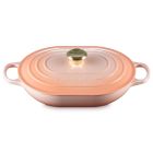 Le Creuset Signature 3.75 Qt. Oval Casserole against a white background shot from the side slightly above Image
