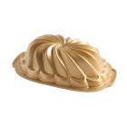 Nordic Ware Pirouette Loaf Pan with Loaf on Table Image