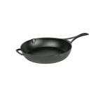 Lodge Blacklock Triple Seasoned 7" Cast Iron Skillet against a white background from the side, angled with the handle to the right  Image