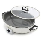 image shows GreenPan Elite 5.5-Quart Oval Electric Skillet | Cream  against a blank, white background  Image