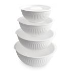Four bowls filled with various types of food, showcasing a colorful assortment of ingredients and dishes. Image