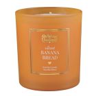 image shows Old World Christmas Candle | Iced Banana Bread Candle  against a blank, white background Image