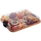 A tray filled with an assortment of colorful foods, including fruits, vegetables, and snacks, arranged neatly. Image