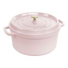 image shows Staub 7 Qt. Round Dutch Oven | Peony Pink against a blank, white background Image