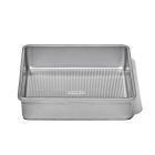 image shows OXO Good Grips Non-Stick Pro 9" Square Cake Pan | Clear Coated against a blank, white background Image