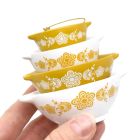 image shows Twinkl Toast Pyrex-Inspired Miniature Cinderella Bowl Stack Ornament | Butterfly Gold against a blank, white background Image