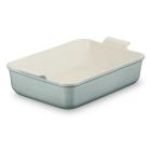 image shows Le Creuset Heritage 6.75 Qt. Stoneware Deep Rectangular Lasagna Dish | Sea Salt  against a blank, white background
 Image