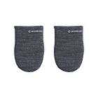 Le Creuset Mitts against a white background, shot directly from above  from the front. A LE Creuset Logo is stitched in white.  Image