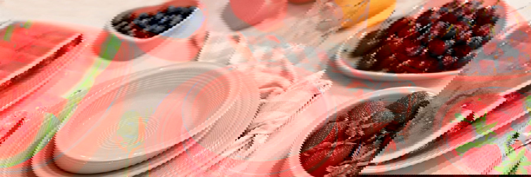 Photo of Fiesta Peony dinnerware on a tabletop.